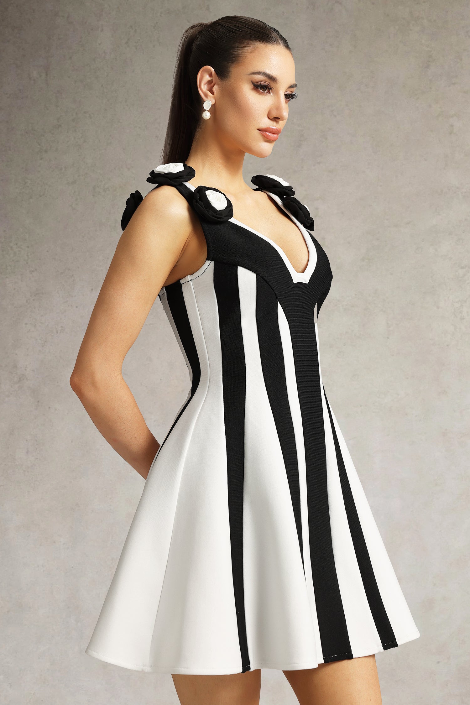 Serela Sleeveless V-Neck Flower Bandage Mini Dress