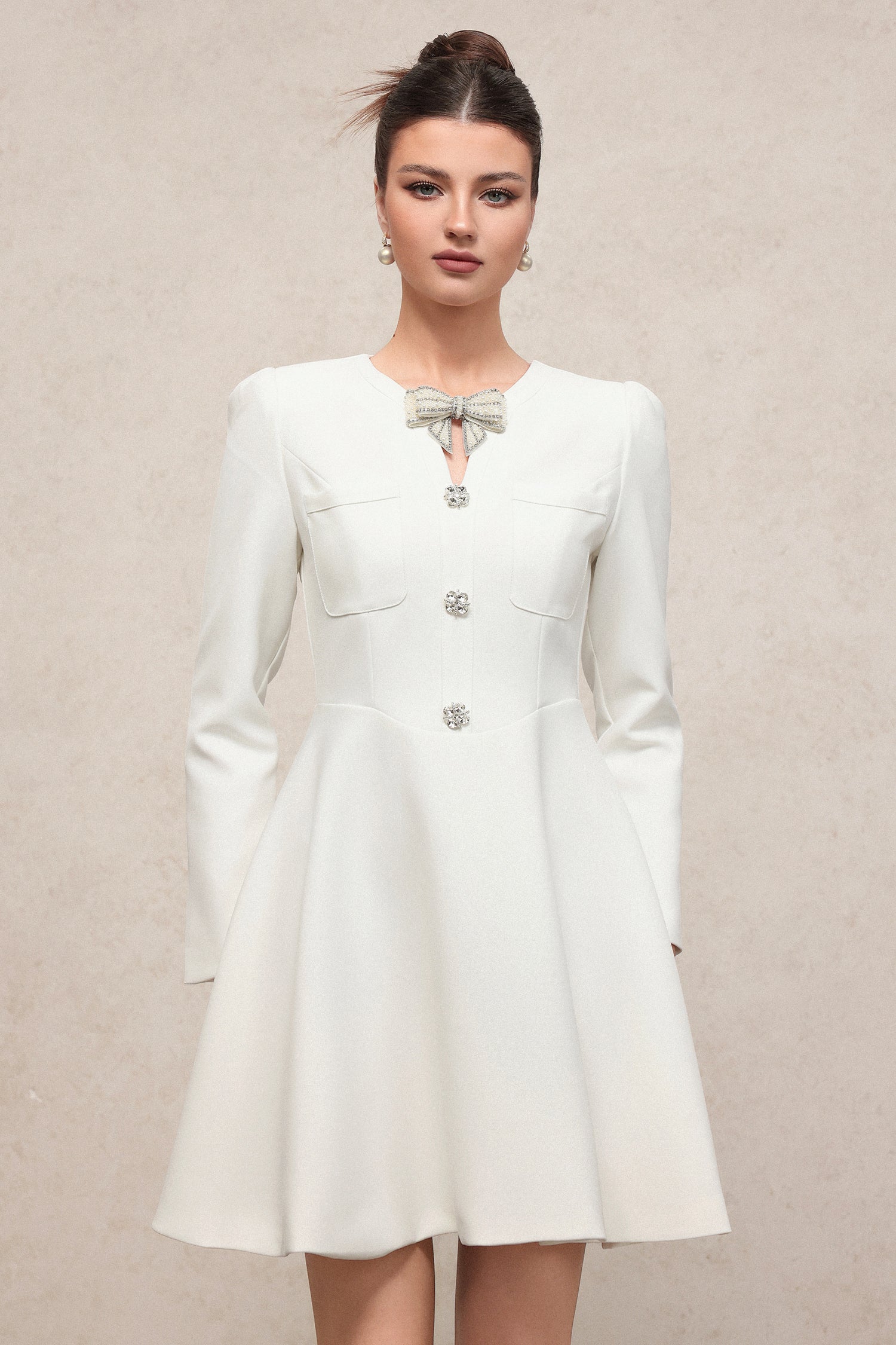 Gacia Elegant Contour Long Sleeve Rhinestone Bow Knit Mini Dress