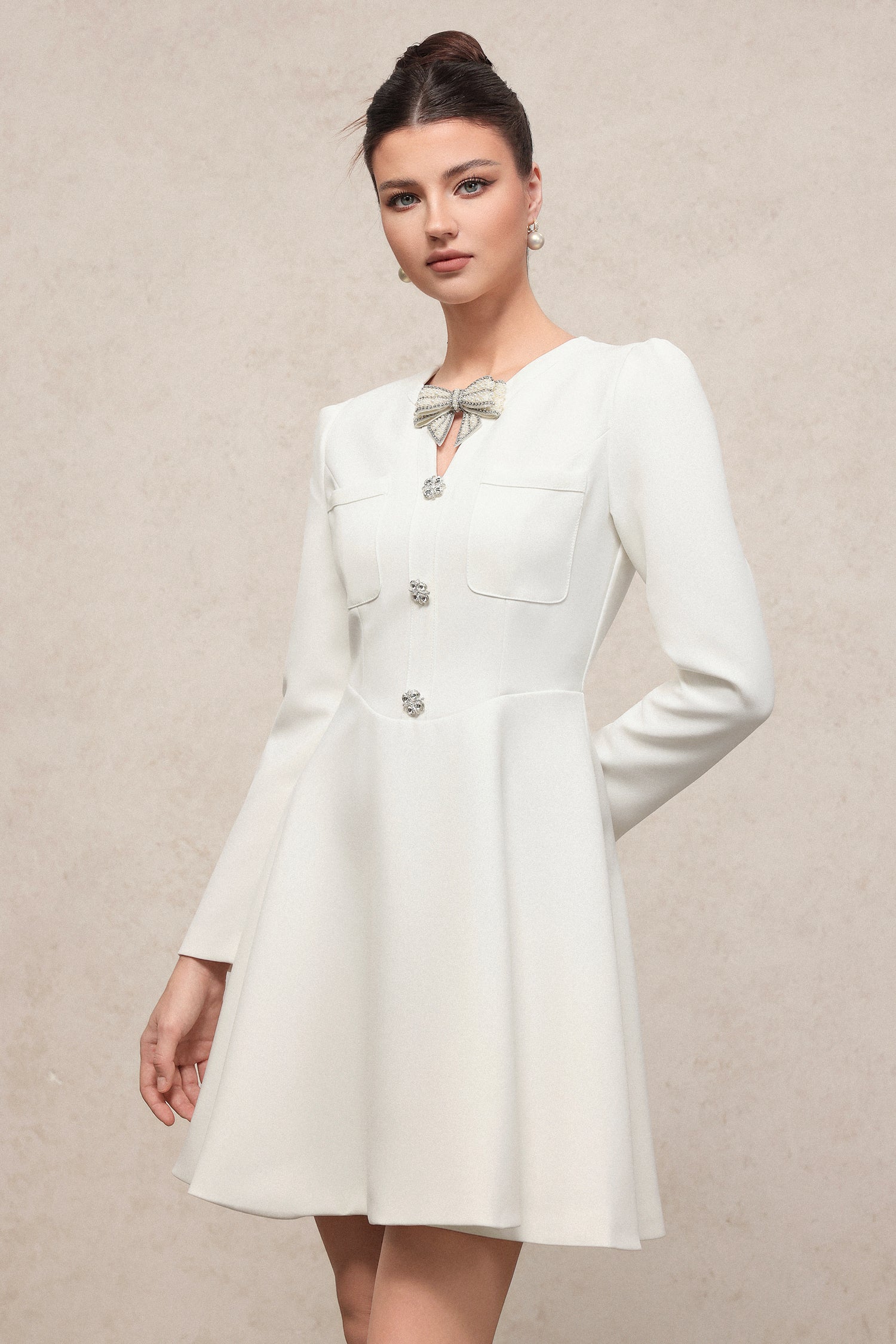 Gacia Elegant Contour Long Sleeve Rhinestone Bow Knit Mini Dress